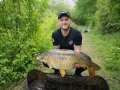 Luke with a stunning common carp